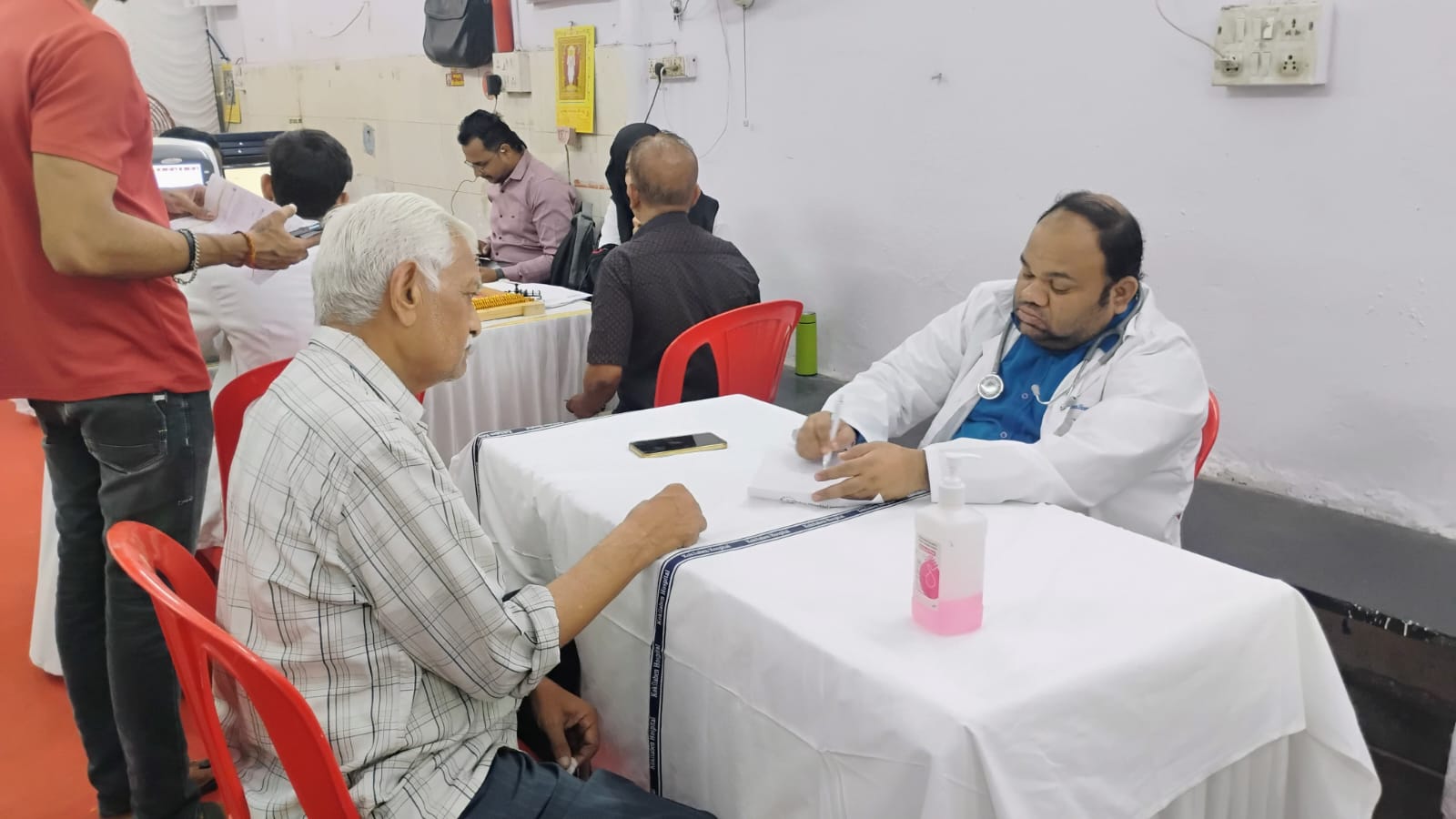 Doctor consulting a patient during the camp